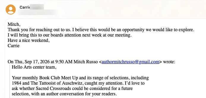 Privacy-redacted reply from a book-club organizer expressing interest in presenting the book to the board